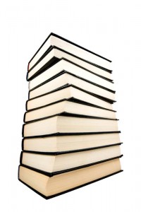 Stack of black  books isolated on the white background.