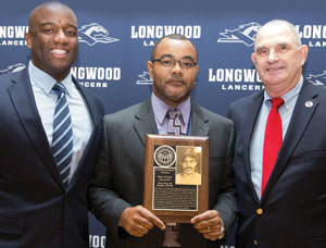 Director of Athletics Troy Austin (left) with Kelvin Davis ’88 and former baseball head coach Buddy Bolding.